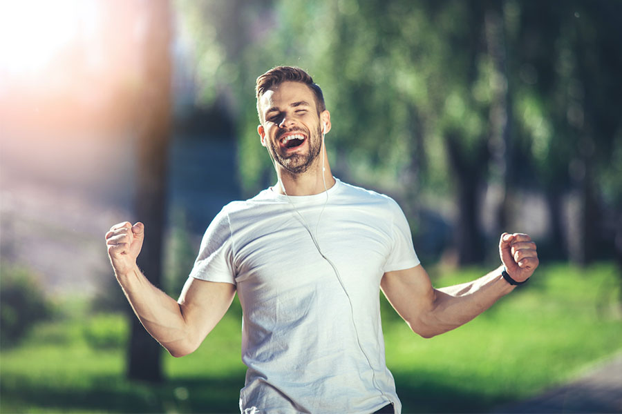 A happy man after completing individualized treatment at Olympus Recovery, one of the best treatment centers in Delray Beach for drug and alcohol addiction recovery