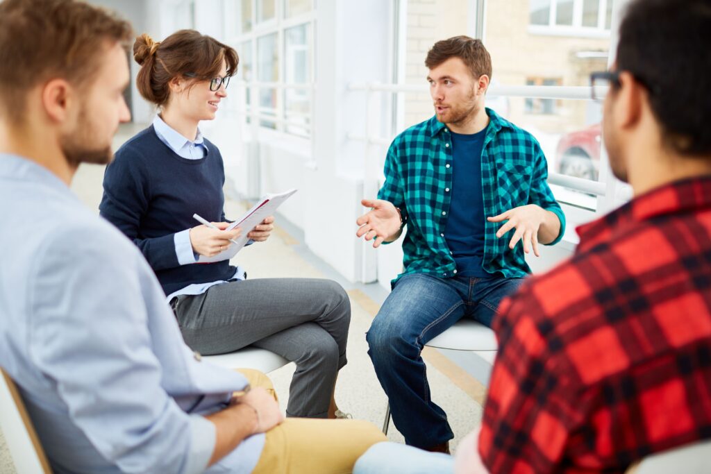 A group therapy session at a drug and alcohol rehab center