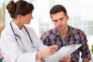 Patient receiving counseling and MAT medication in a supportive addiction treatment environment